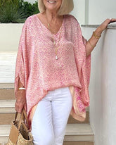 Tryck Lös blus med dolmanärmar